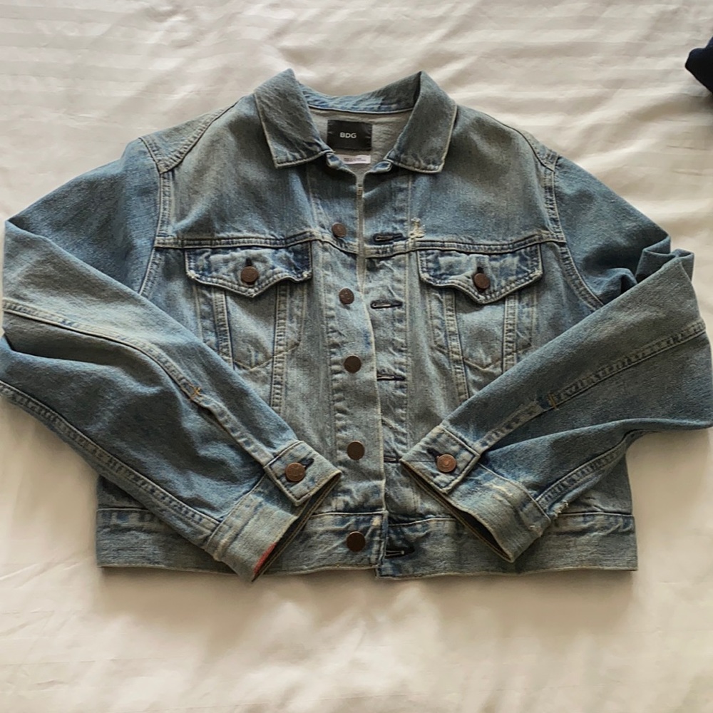 Denim jacket with brass buttons